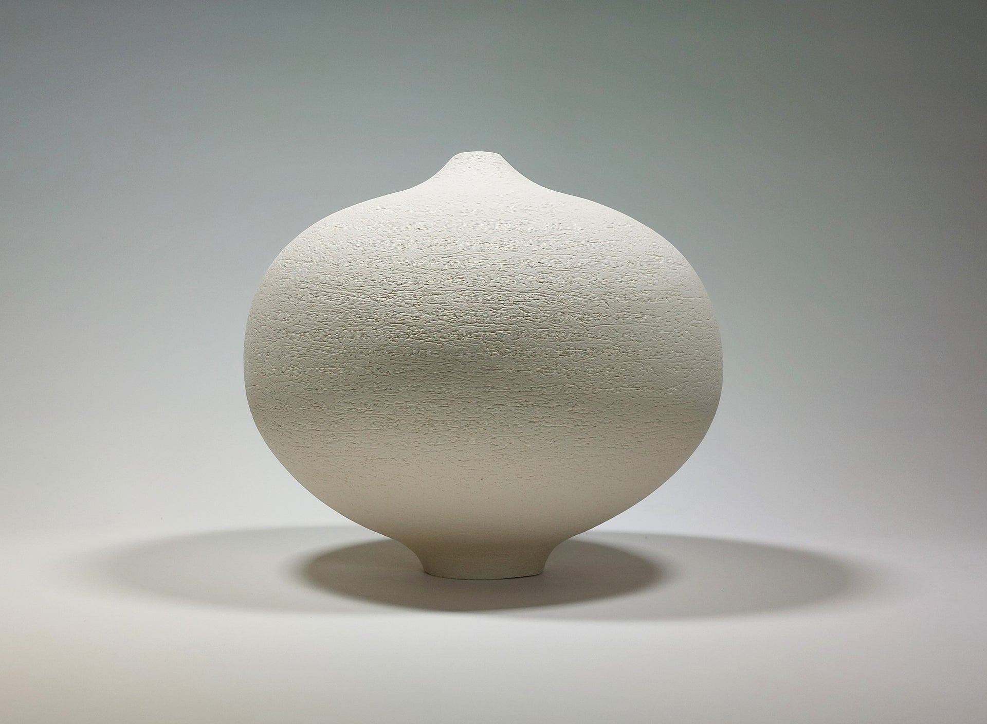 Small White Ceramic Vessel
