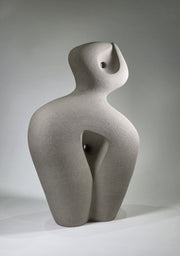 Abstract ceramic sculpture on a grey background